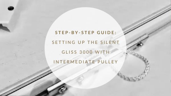 A technician from The Curtain Pole and Track Company setting up the Silent Gliss 3000 curtain track with an intermediate pulley."